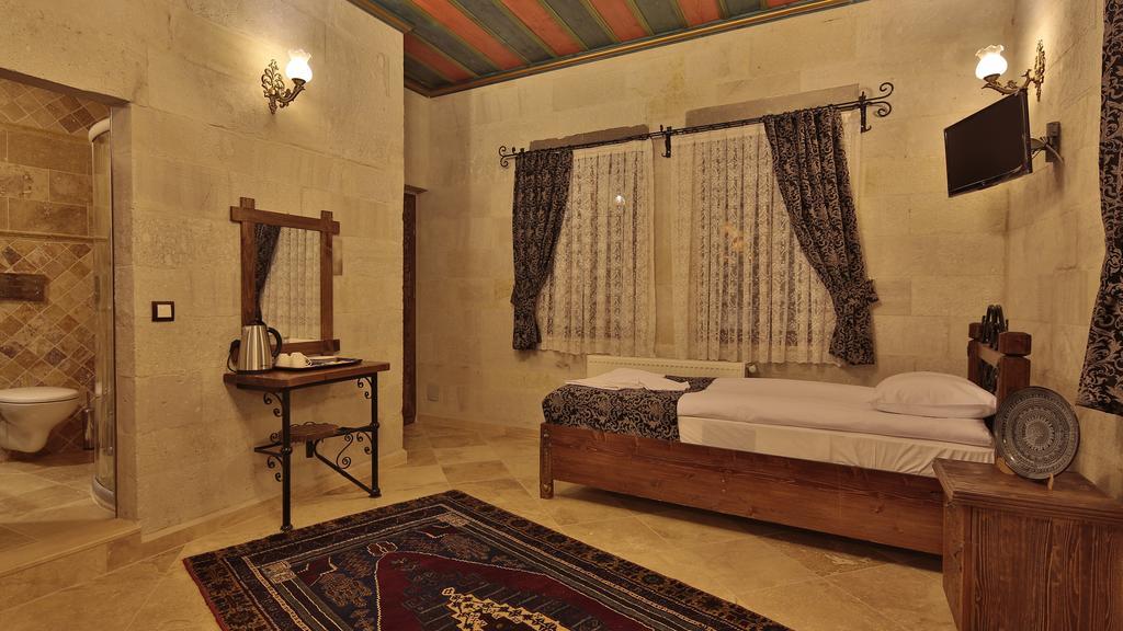 גורמה Cappadocia Cave Land Hotel חדר תמונה